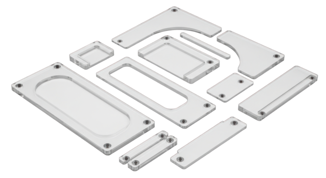 White plastic components arranged for various industrial applications.