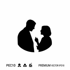 Silhouette of a man and woman engaged in a serious conversation.