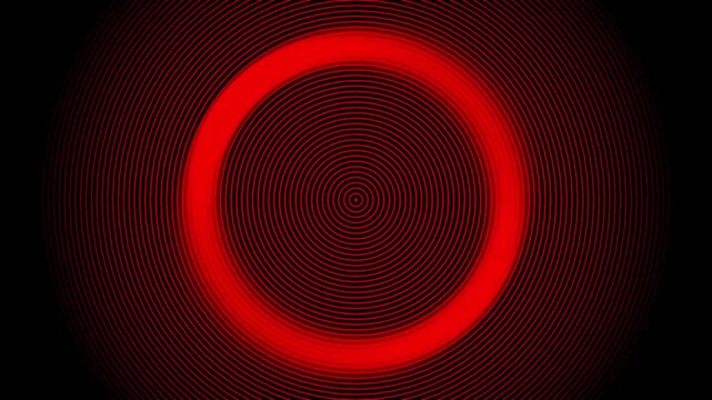 Red glowing concentric circle vortex with animation ring and hypnotic digital pulse effect in abstract design