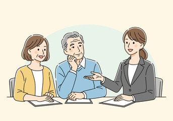 Financial advisor explaining something to an elderly couple, who are listening attentively