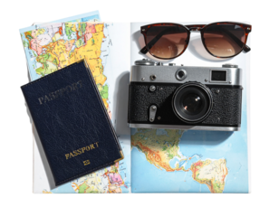 Travel Essentials Flat-Lay Passport, Sunglasses, Camera, Map on Transparent Background PNG