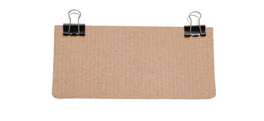 Corrugated cardboard sheet with two black binder clips isolated on a white background, blank kraft paper board for notes