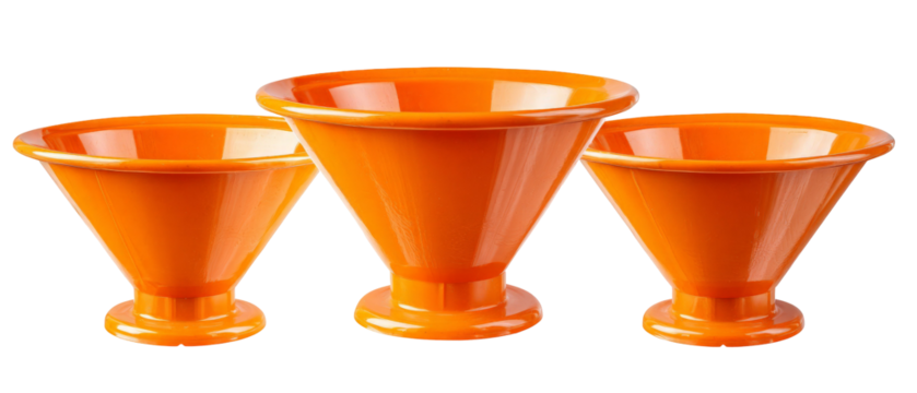 Three vibrant orange funnels of varying sizes arranged in a row, showcasing their smooth curves and glossy finish against a clean white background, ideal for kitchen or industrial use