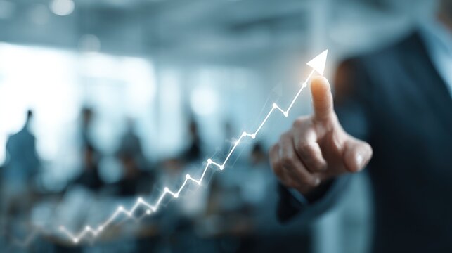 Businessman points to glowing upward trend line in office setting. - Powered by Adobe