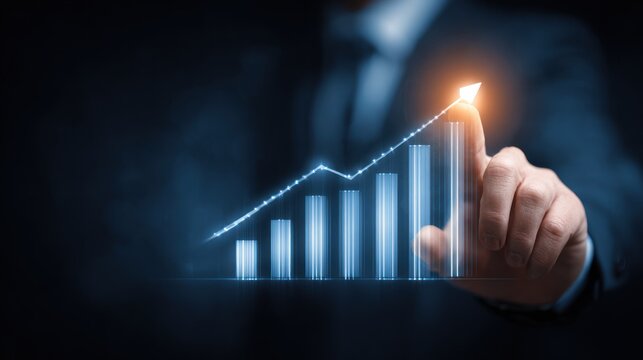 Businessman points to glowing upward trend on digital bar chart projection