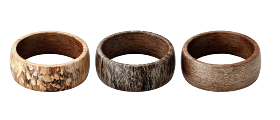 A collection of three distinct wooden rings showcasing unique textures and colors, arranged side by side against a clean background, ideal for jewelry enthusiasts and artisans