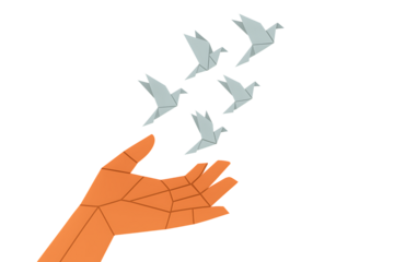 Hand releasing origami paper birds flying away, freedom, peace, hope, new beginnings, opportunity