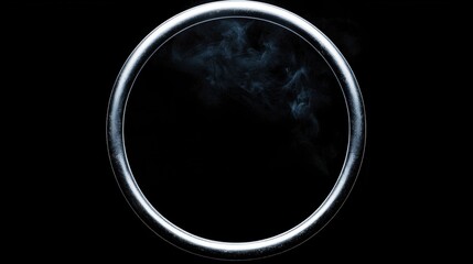 A silver ring with a black background.