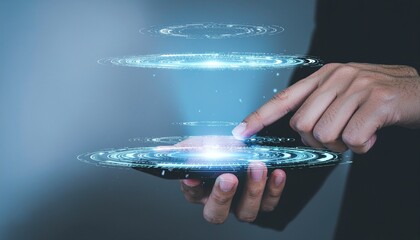 Business hand interacts with a smartphone emitting glowing blue holographic digital data ringscircles.