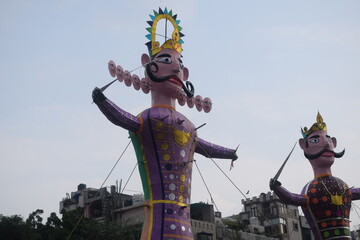 Ravnans being ignited during Dussehra festival at ramleela ground in Delhi, India, Big statue of Ravana to get fire during the Fair of Dussera to celebrate the victory of truth by Lord Rama