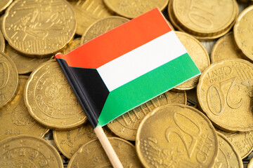 Kuwait flag on coins background for finance banking business.