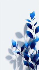 Vibrant blue foliage with elongated leaves and stems casts shadows against a light gray background; minimalist aesthetic