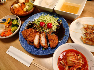 Nagoya specialty (Nagoya cuisine) - Miso cutlet set meal made with Hatcho miso (includes some small bowls, soup, and dessert) / 名古屋名物(なごやめし)～八丁味噌を使った味噌カツ定食(温野菜サラダと焼きギョーザの小鉢料理，椀物，デザート付き)