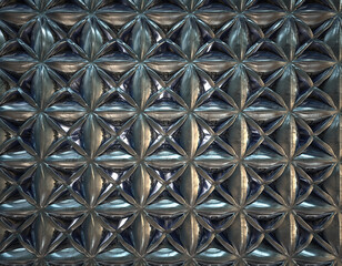 Close-up of a repeating geometric pattern with a metallic, reflective surface.