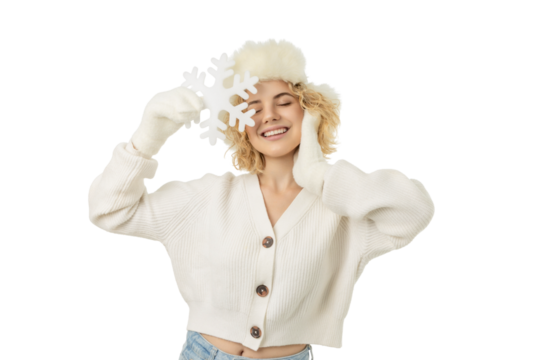 Person enjoys winter spirit with snowflake in hands, isolated, PNG