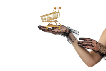 Gloved hands hold a golden shopping cart, isolated, PNG