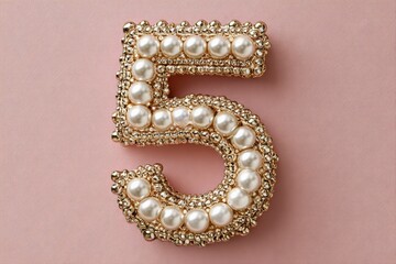 Elegant Number Five Decoration with Pearls and Gems on Pink Background