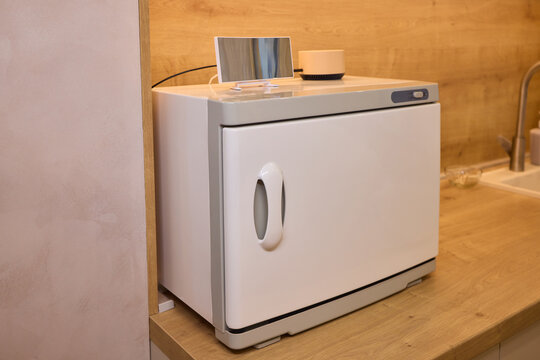 Spotless spa environment with serene ambiance and well-arranged tools, Hygienic beauty studio featuring tranquil setting with systematically organized treatment essentials