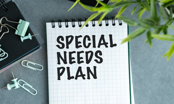 A notebook with the words Special Needs Plan written on it