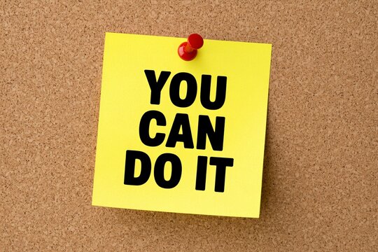 Motivational Yellow Sticky Note on Cork Board with Positive Message - Powered by Adobe