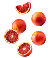 dynamic photograph of whole and halved sicilian blood oranges, showing the vibrant red citrus pulp,...