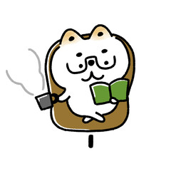 ホットの飲み物を飲みながら読書する白い柴犬