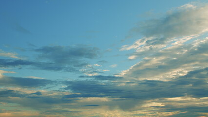 Fototapeta premium A Stunning and Beautifully Artistic Cloudy Sky at Sunset, Radiating an Aura of Peace and Inspiration