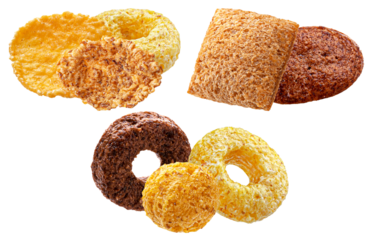 isolated macro shot showcasing a diverse mix of breakfast cereal components, including crunchy corn flakes, chocolate loops, and small sweetened grain squares on black.