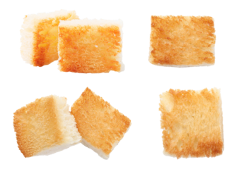 four separate pieces of perfectly toasted, square-cut bread, featuring a crisp golden brown top surface ideal for use as premium gourmet croutons or savory appetizers.