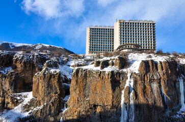 snow and frozen waterfalls on the rocks of Arpa river canyon in Jermuk (Vayots Dzor, Armenia)