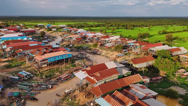 Aerial view of kampong phluk, a traditional floating village with stilt houses on the tonle sap lake in cambodia's siem reap province.
