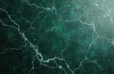 Obraz premium Deep green marble surface with intricate white veins creating a natural abstract pattern. Its glossy finish and rich color suggest luxury and elegance for various design projects.