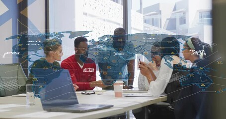 Standing leader leaning in, pointing, activating map overlay with icons to explain business KPIs - Powered by Adobe
