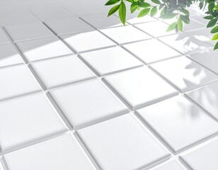 White tiles with leaves, dappled sunlight