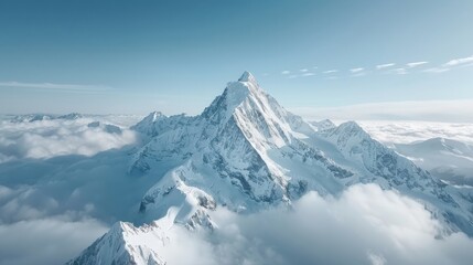 A bird's-eye view of a majestic mountain range with snow-capped peaks.