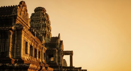 Fototapeta premium Angkor Wat temple silhouette, an iconic Khmer architecture marvel at sunset