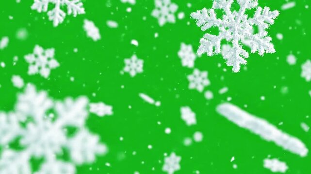White snowflakes falling against a green background for christmas holiday season effect overlay style