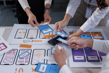 Ux ui designers collaborating on mobile application prototyping