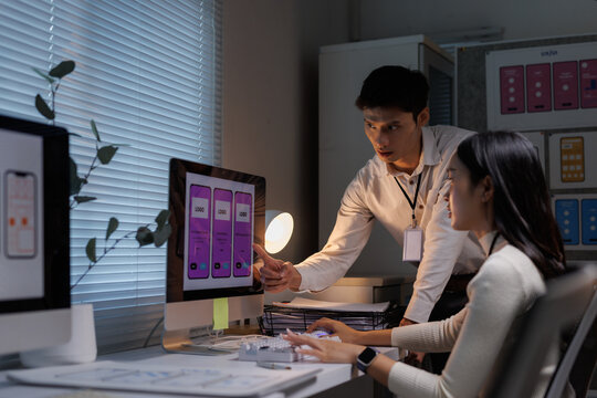 Ui ux designers collaborating on mobile app development