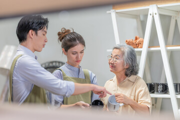 Mother and Family Business Owner Teaching About Material Production and Recycling