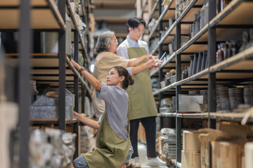 Mother and Family Business Owner Teaching About Material Production and Recycling