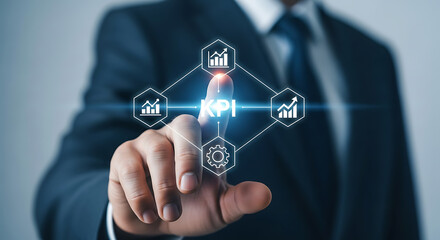 Businessman touching a KPI interface on a virtual screen showing data analysis, business processes and performance indicators.