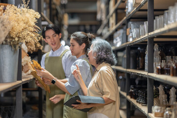 Mother and Family Business Owner Teaching About Material Production and Recycling