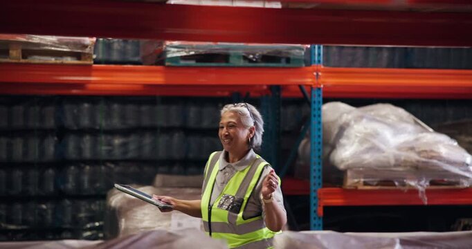 Distribution, dancing and happy woman in factory, tablet and spinning with achievement. Mature person, smile or employee in warehouse, promotion or celebration with logistics, supply chain and bonus