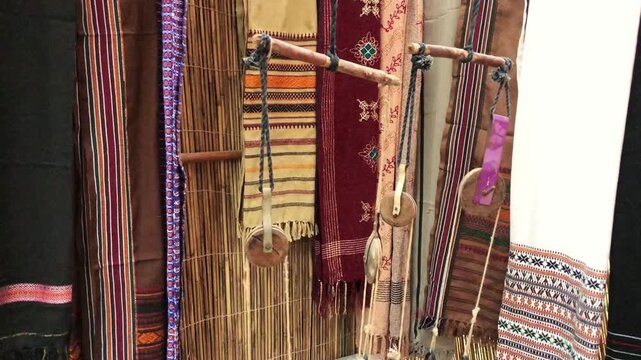 closeup side view of loom part , which is used traditional techniques for making shawls, fabrics, sarrie and asian dresses
