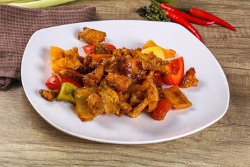 Asian cuisine - roasted crocodile meat