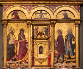Florence - The renaissance painting of St. Nicholas, Julian, John the Bap. and Sigismondo in the church church Chiesa di San Felice in Piazza by Neri di Bicci (1467)