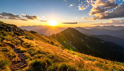 Mountain ridge path with golden grass, distant peaks, vibrant sunset sky