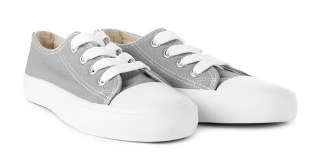 Pair of grey kid's sneakers isolated on white. Stylish shoes