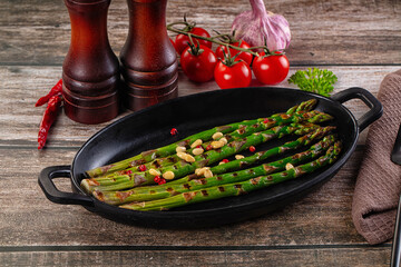 Grilled asparagus sprouts with cedar